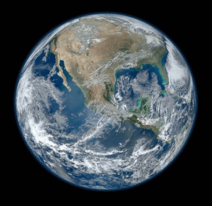 Satellite view of Earth showing North America in daylight against black space